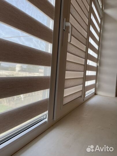 Жалюзи и рулонные шторы на окна