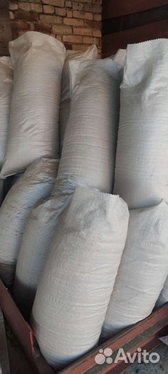 Опилки в мешках