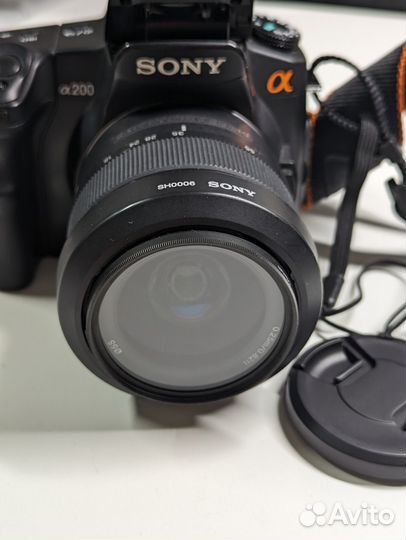 Зеркальная фотокамера с объективом