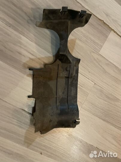 Нижний Кожух фар e34