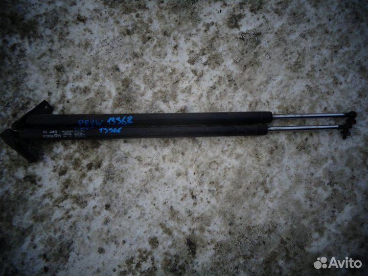 Амортизатор багажника задний Mitsubishi Delica