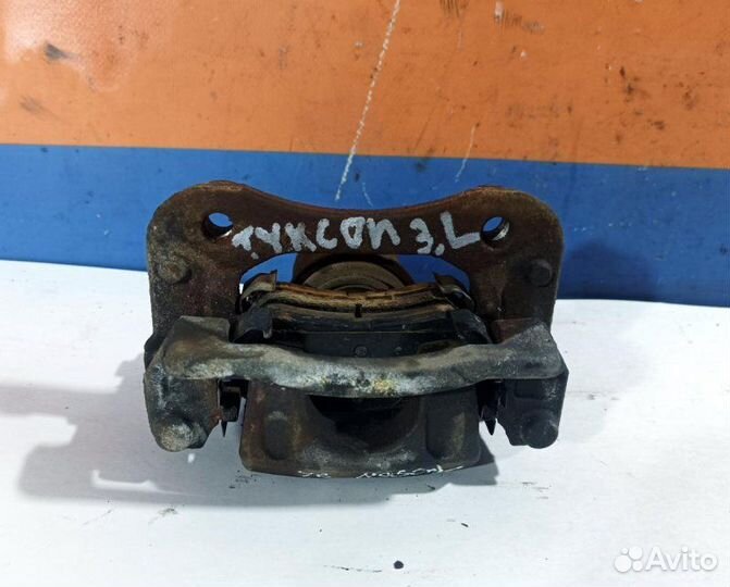 Суппорт тормозной задний левый Hyundai Tucson 3 TL