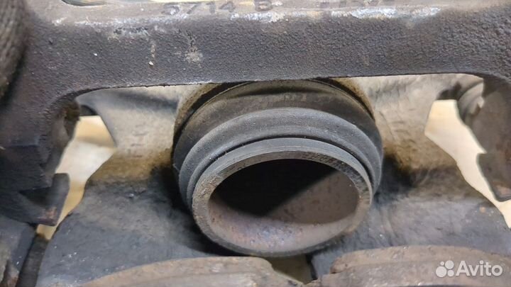 Суппорт левый передний Volkswagen Tiguan