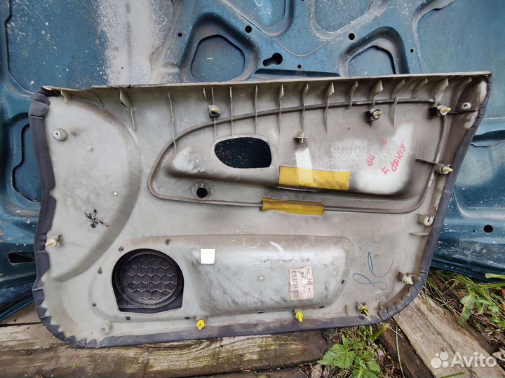 Дверная карта передняя левая Mitshubishi Lancer 7