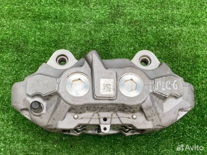 Суппорт тормозной передний левый Mercedes-Benz