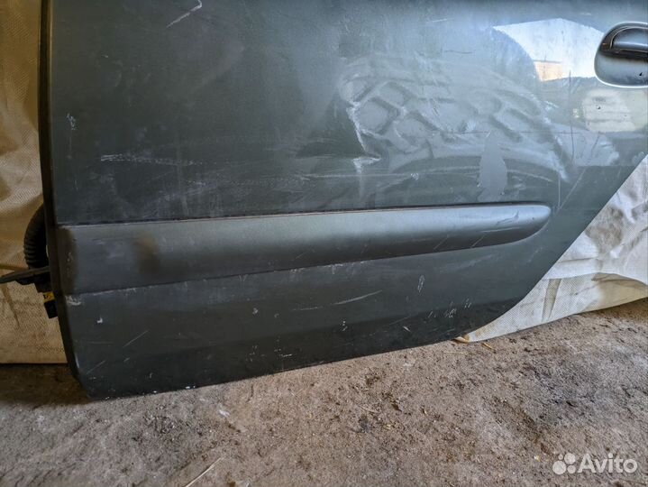 Задняя левая дверь Renault Symbol