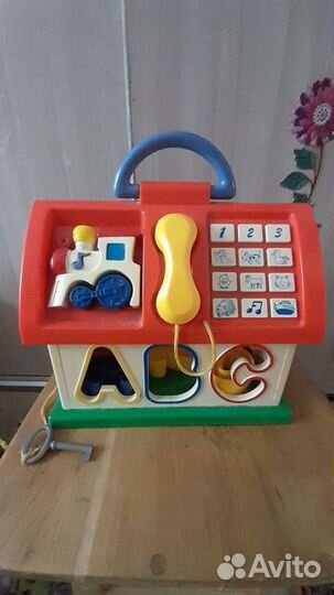 Развивающая игрушка дом