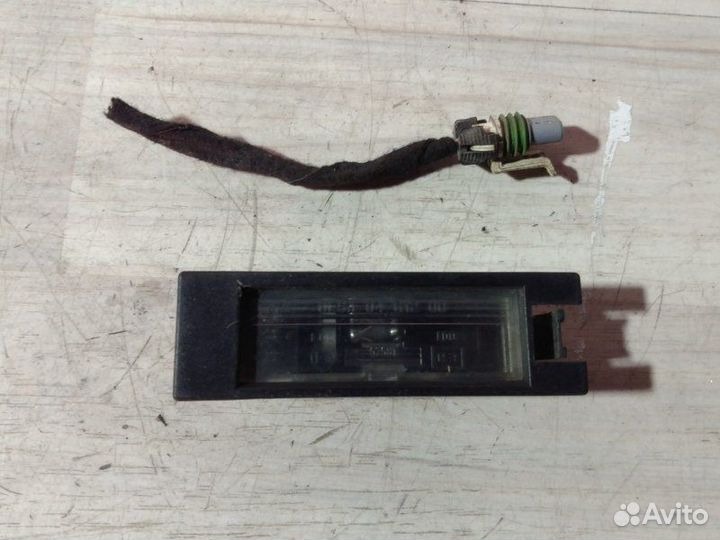 Освещение номерного знака заднее Opel Meriva A