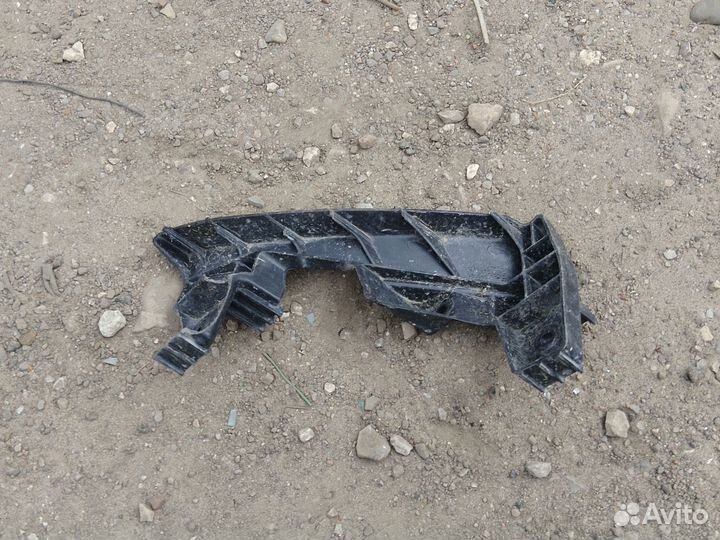 Кронштейн бампера Kia Sportage передний левый