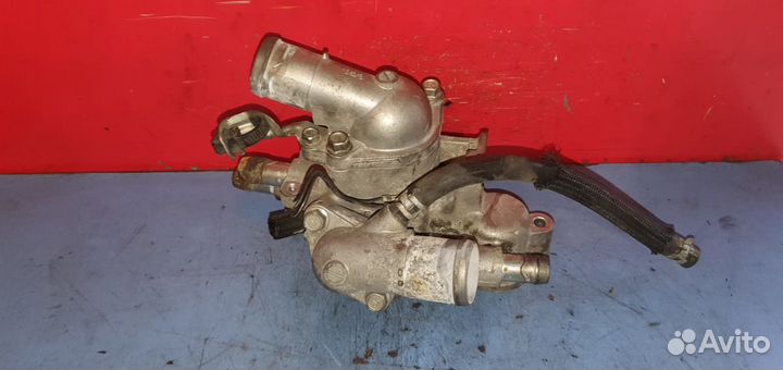 Фланец системы охлаждения Mitsubishi Lancer X 4B11