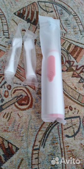 Электрическая зубная щетка