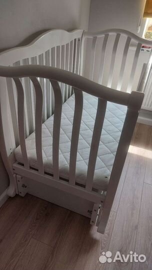 Детская кроватка с продольным маятником Юлиана