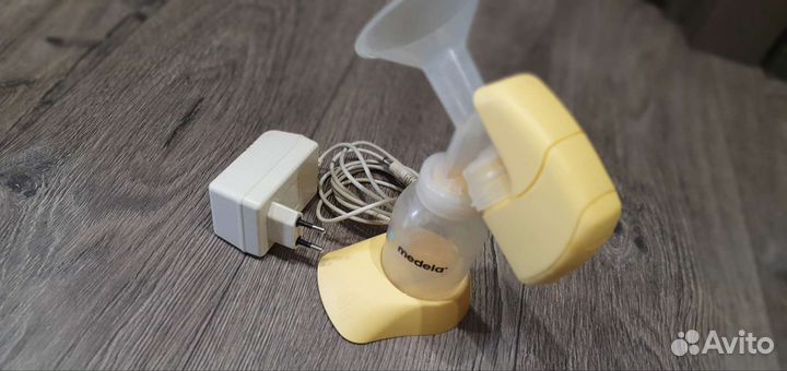 Молокоотсос medela электрический