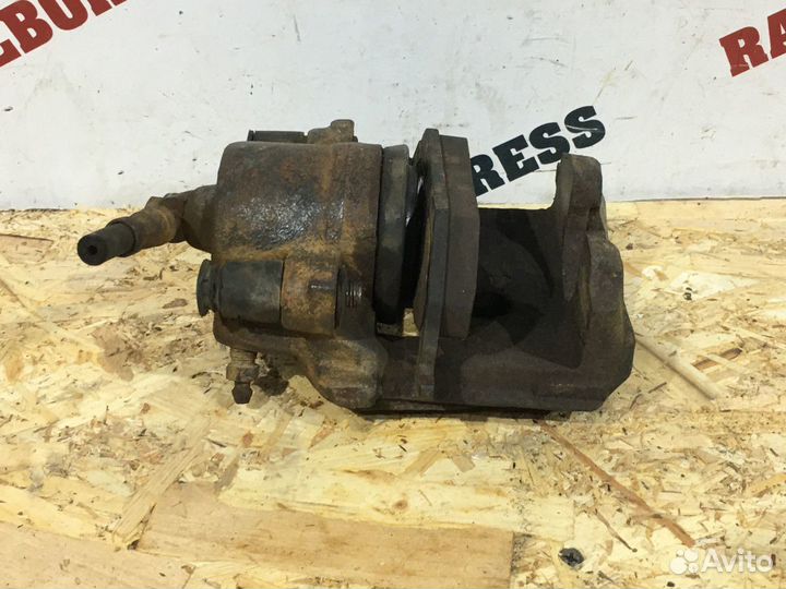 Суппорт тормозной передний левый Skoda Octavia A5