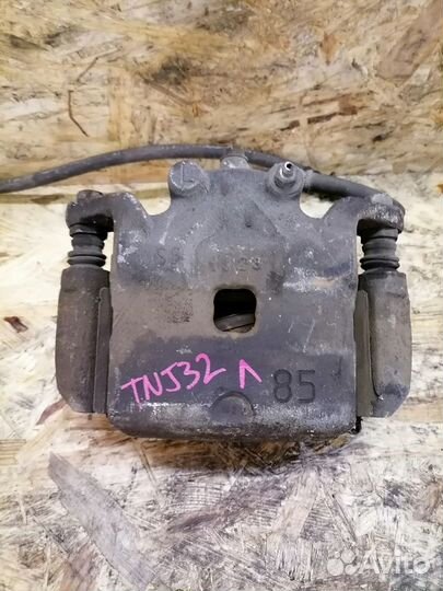 Суппорт тормозной передний Nissan Teana J32 4WD