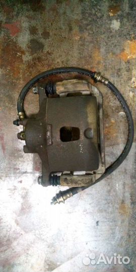 Суппорт nissan note, левый передний NE11