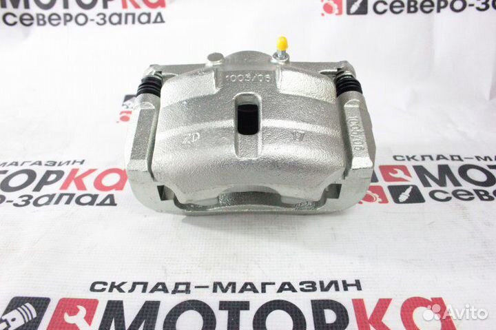 Суппорт тормозной передний левый Nissan X-Trail