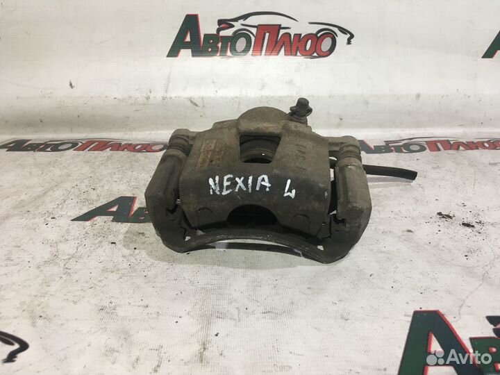 Суппорт передний левый Daewoo Nexia