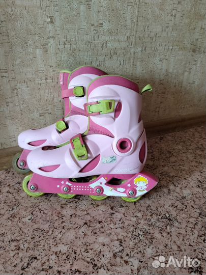 Роликовые коньки