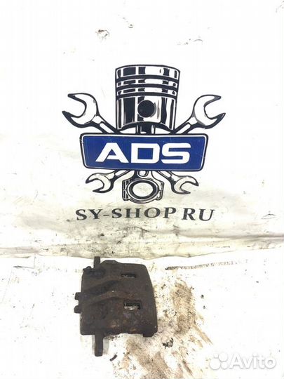 Суппорт тормозной передний левый Ssangyong Kyron 1