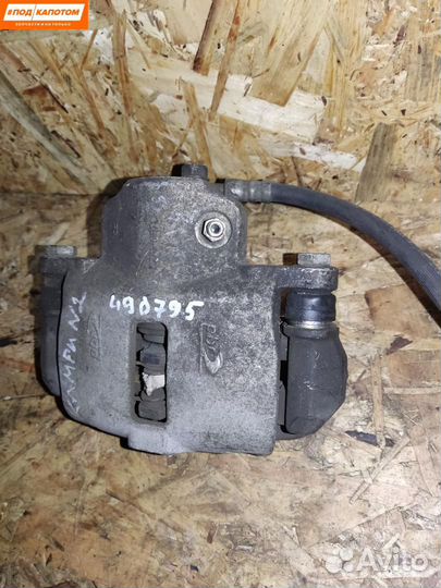 Суппорт тормозной задний правый Toyota Camry XV40