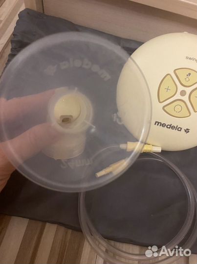 Молокоотсос medela электрический