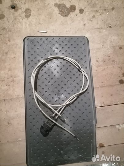 Трос корректора фар Renault logan