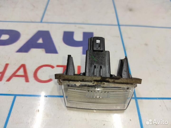 Фонарь подсветки номера Toyota Corolla E18 812700D