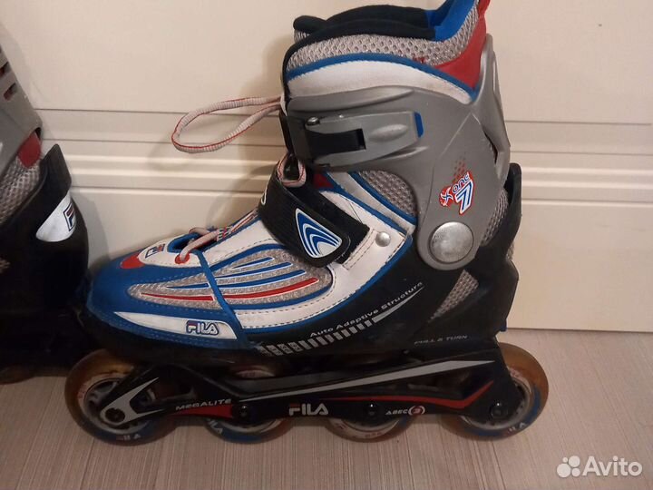 Роликовые коньки