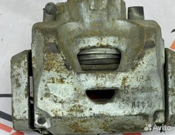 Суппорт тормозной передний правый Citroen Berlingo