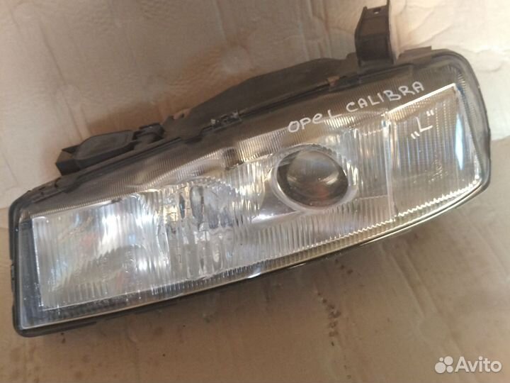 Передняя левая фара Опель Калибра