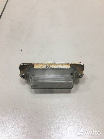 Фонарь подсветки номера Mitsubishi Colt