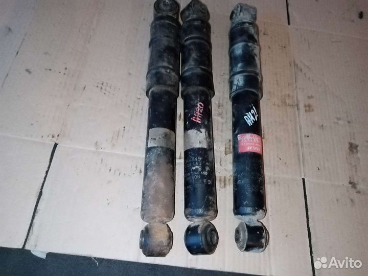 Амортизатор задний Опель Астра Н