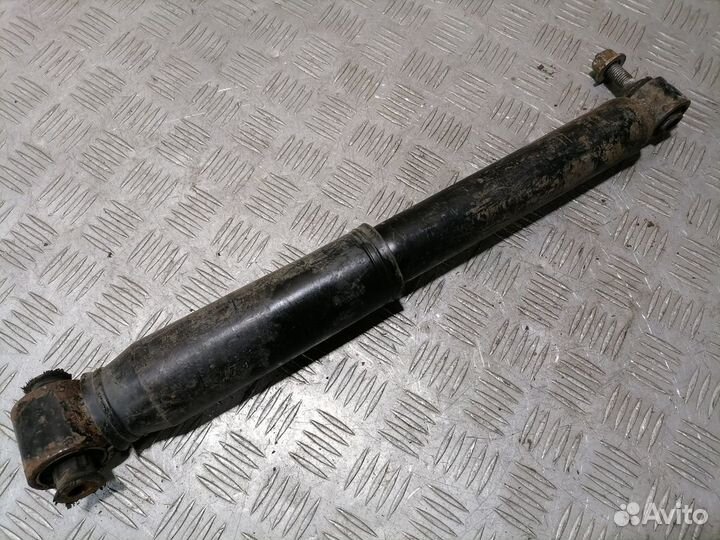 Амортизатор задний левый Renault Scenic 2003 2009