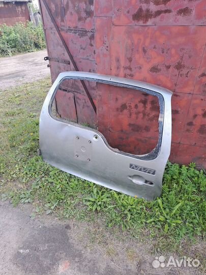 Хлопушка багажника на Ниву Шевроле