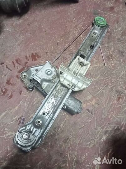 Стеклоподъемник задний левый Ford Focus I