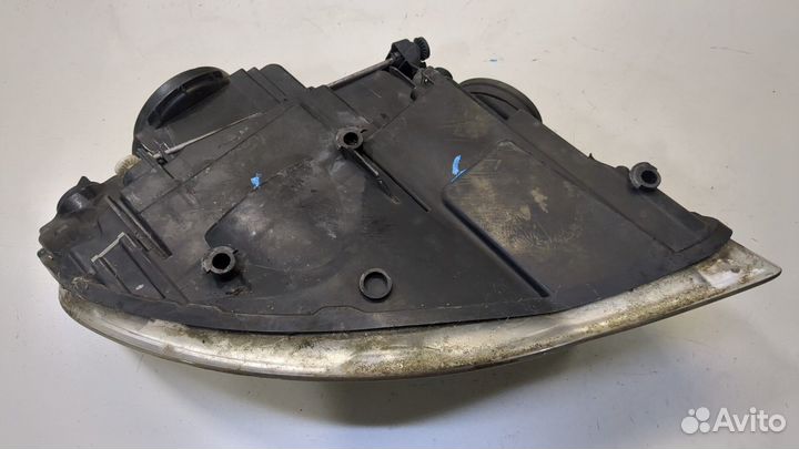 Фара (передняя) левая Volkswagen Touareg