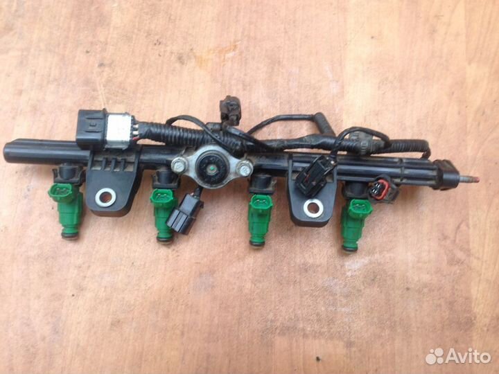 Рейка топливная Кио рио 1.4