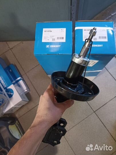 Амортизатор передний левый Opel Astra G