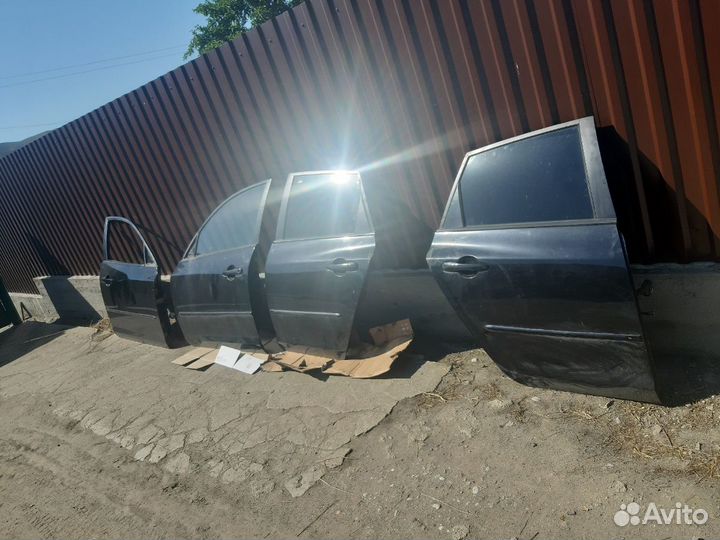 Двери мазда 3 бк ровные, не шпаклеванные