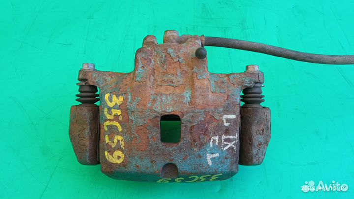 Суппорт передний левый для Mitsubishi Lancer 9