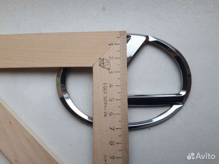 Эмблема lexus