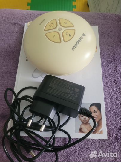 Молокоотсос medela электрический
