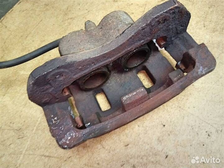 Суппорт тормозной передний левый Hyundai Santa Fe