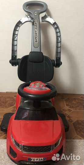 Машинка каталка с ручкой