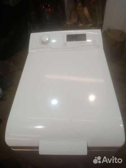 Стиральная машина с вертикальной загрузкой