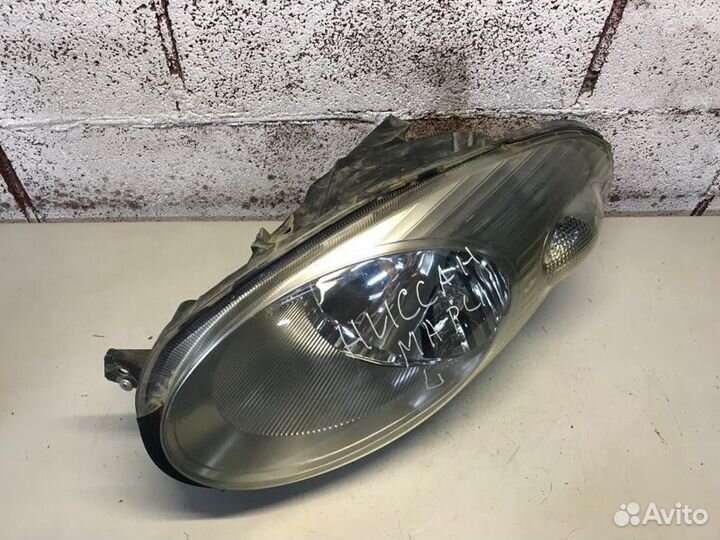 Фара левая Nissan March 3 AK12