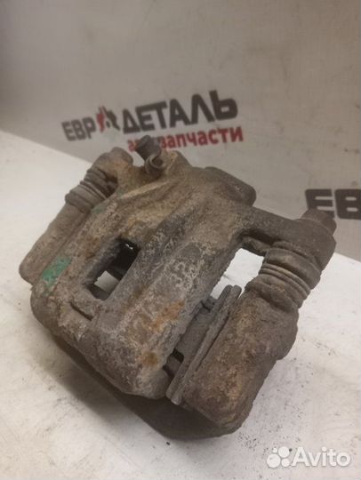 Суппорт тормозной задний левый Chevrolet Lacetti