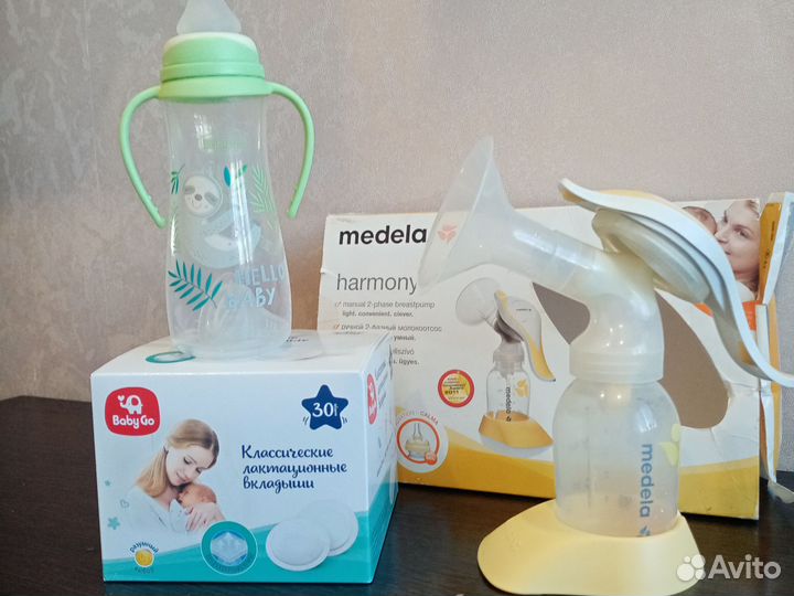 Молокоотсос medela ручной+вкладыши и бутылочка