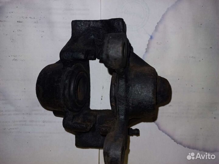 Суппорт задний левый Mercedes W124 универсал